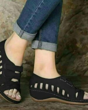 Buckal Black Wedge Sandals.